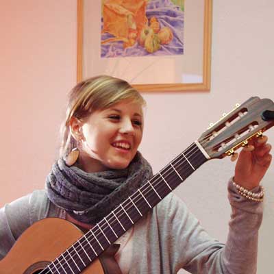 Gitarrenschülerin